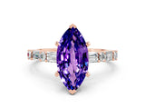 Rose gold Marquise Cut Tanzanite Solitaire with Side Baguettes and Channel Set Band