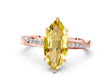 Rose gold Marquise Cut Yellow Sapphire Engagement Ring with Side Stone Accents and Four-Prong Setting_51