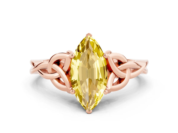 Rose gold Marquise Cut Yellow Sapphire Solitaire Engagement Ring with Celtic Knot Band and Four-Prong Setting