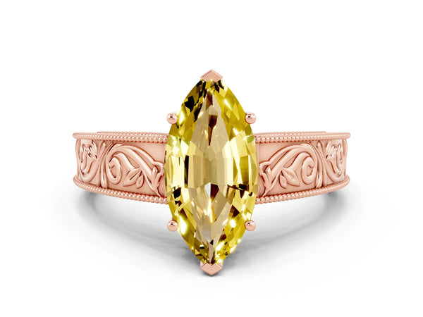 Rose gold Marquise Cut Yellow Sapphire Solitaire Ring with Engraved Band and Four-Prong Setting