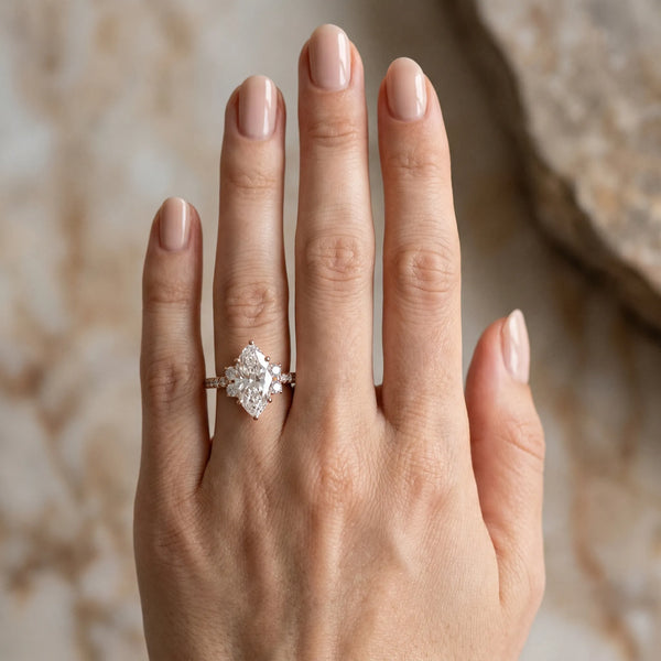 Rose gold Marquise Diamond Three-Stone Pave Band with Four-Prong Setting
