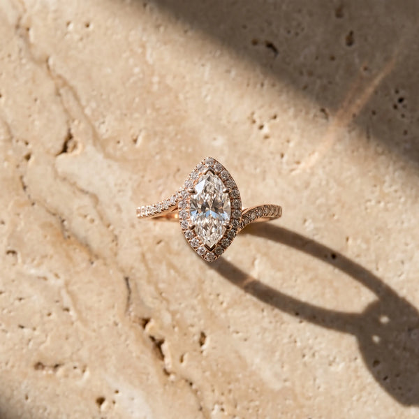 Rose gold Marquise Halo Twist Band with Four-Prong Setting