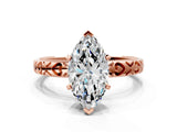 Rose gold Marquise Solitaire Diamond Engagement Ring with XO Engraved Band and Four-Prong Setting