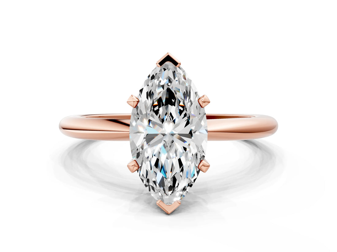 Rose gold Marquise Solitaire Diamond Ring with Six-Prong Setting on a Classic Band