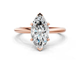 Rose gold Marquise Solitaire Diamond Ring with Six-Prong Setting on a Classic Band