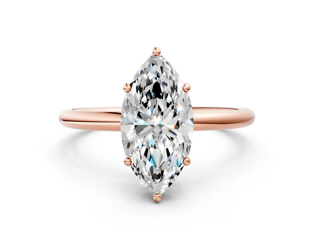 Rose gold Marquise Solitaire Diamond Ring with a Classic Band and Four-Prong Setting