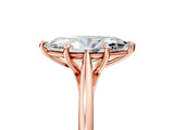 Rose gold Marquise Solitaire Engagement Ring with Four-Prong Setting and Classic Band 1