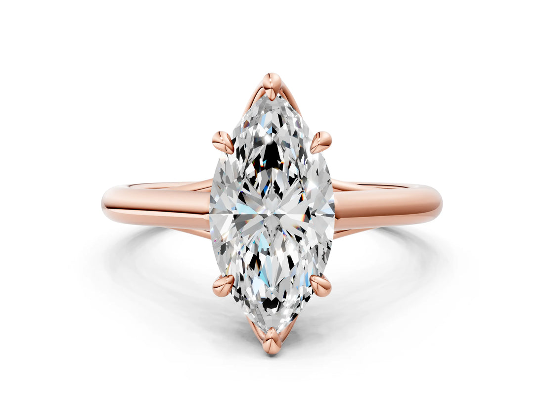 Rose gold Marquise Solitaire Engagement Ring with Six-Prong Setting and Classic Band