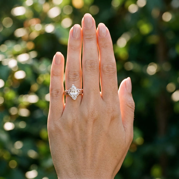 Rose gold Marquise Solitaire Filigree Engagement Ring with Halo and Prong Setting