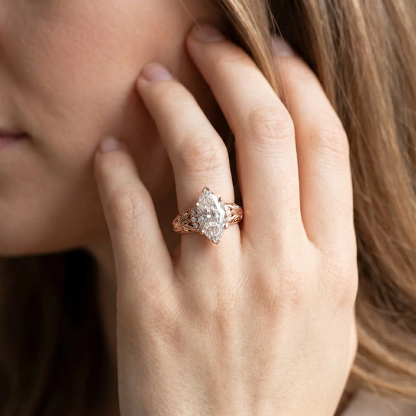 Rose gold Marquise Solitaire Filigree Engagement Ring with Halo and Prong Setting