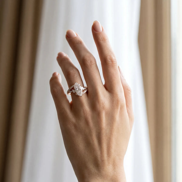 Rose gold Marquise Solitaire with Pavé Twist Band and Four-Prong Setting