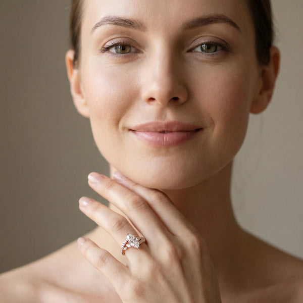 Rose gold Marquise Solitaire with Pavé Twist Band and Four-Prong Setting