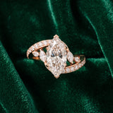 Rose gold Marquise Solitaire with Pavé Twist Band and Four-Prong Setting_16
