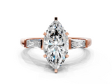 Rose gold Marquise Solitaire with Tapered Baguette Side Stones on a Classic Band with Four-Prong Setting_125