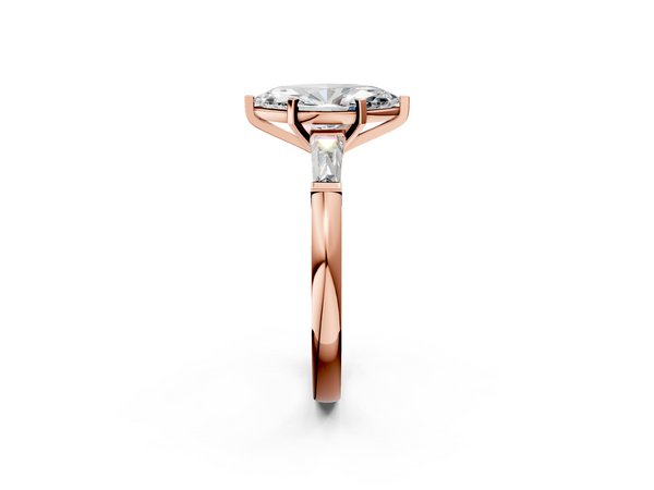 Rose gold Marquise Solitaire with Tapered Baguette Side Stones on a Classic Band with Four-Prong Setting