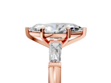 Rose gold Marquise Solitaire with Tapered Baguette Side Stones on a Classic Band with Four-Prong Setting_130