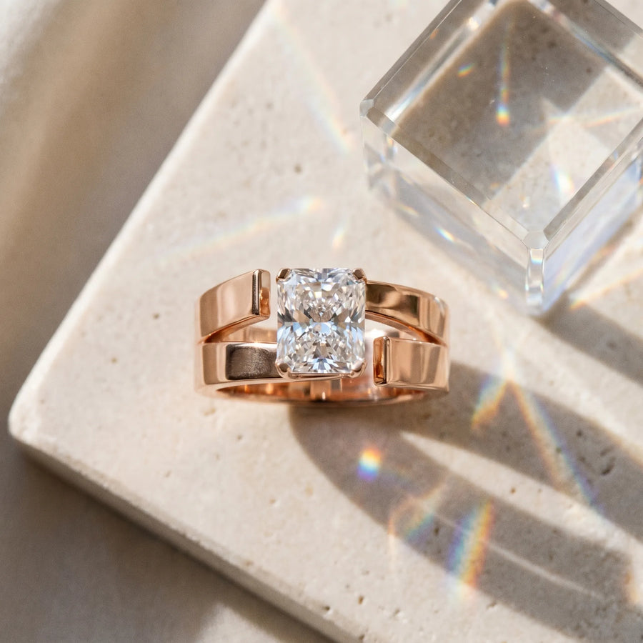 Rose gold Modern Tension Set Radiant Cut Diamond Solitaire Wide Band Ring
