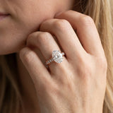 Rose gold Oval Brilliant Cut Diamond Engagement Ring with Pavé Band and Four-Prong Setting_14
