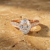 Rose gold Oval Brilliant Cut Diamond Engagement Ring with Pavé Band and Four-Prong Setting_15