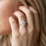 Rose gold Oval Brilliant Solitaire with Side Stones on a Pave Band and Four-Prong Setting_14