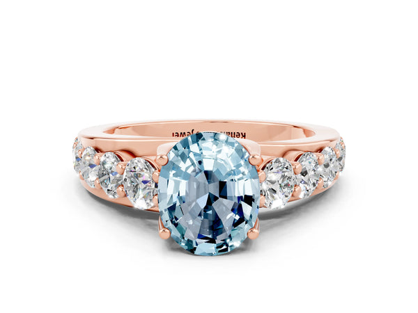 Rose gold Oval Cut Aquamarine Engagement Ring with Pavé Band and Four-Prong Setting