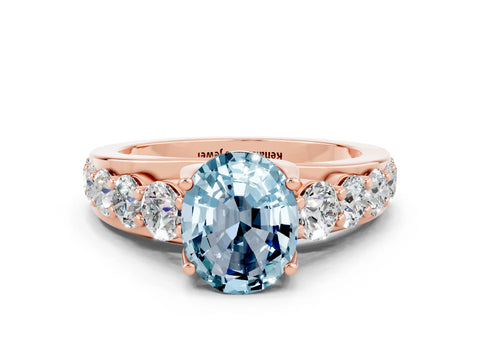 Rose gold Oval Cut Aquamarine Engagement Ring with Pavé Band and Four-Prong Setting