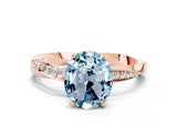 Rose gold Oval Cut Aquamarine Engagement Ring with Side Stone Accents and Four-Prong Setting_60