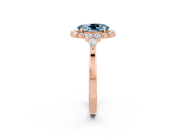 Rose gold Oval Cut Aquamarine Halo Ring with Pear Side Stones and Prong Setting