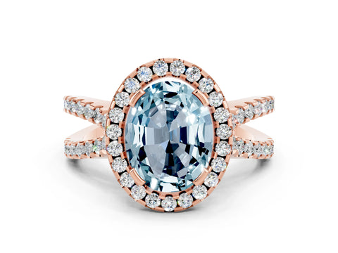 Rose gold Oval Cut Aquamarine Halo Ring with Split Shank Pavé Band and Prong Setting