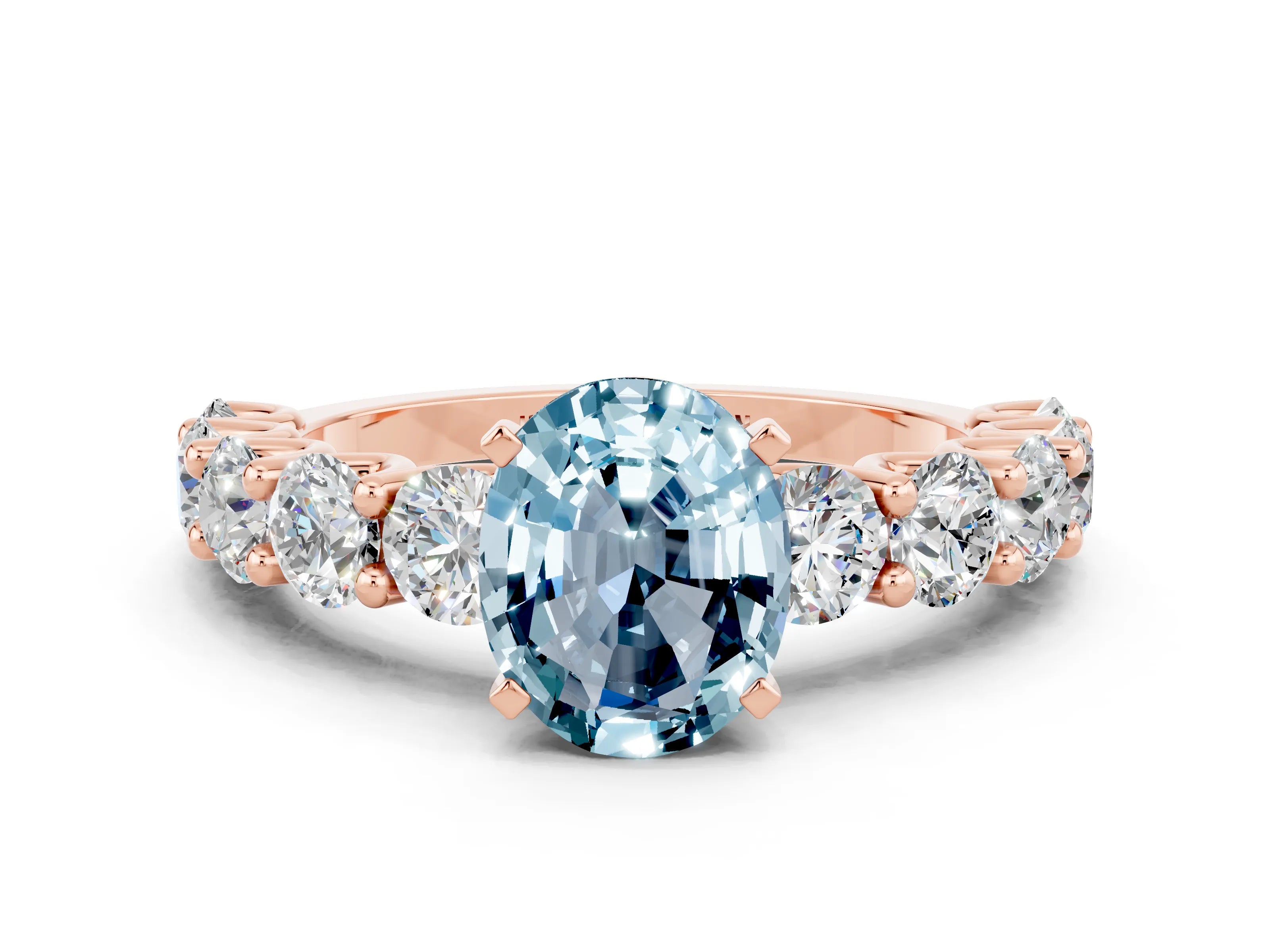 Rose gold Oval Cut Aquamarine Prong Setting with Side Stones on a Pave Band