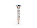 Rose gold Oval Cut Aquamarine Prong Setting with Side Stones on a Pave Band_2