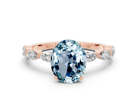 Rose gold Oval Cut Aquamarine Ring with Marquise Side Stones and Prong Setting