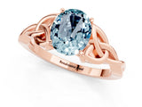 Rose gold Oval Cut Aquamarine Solitaire Engagement Ring with Celtic Knot Band and Four-Prong Setting_1