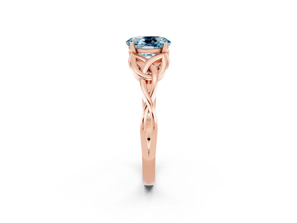 Rose gold Oval Cut Aquamarine Solitaire Engagement Ring with Celtic Knot Band and Four-Prong Setting