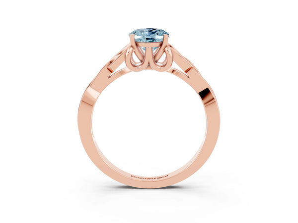 Rose gold Oval Cut Aquamarine Solitaire Engagement Ring with Celtic Knot Band and Four-Prong Setting