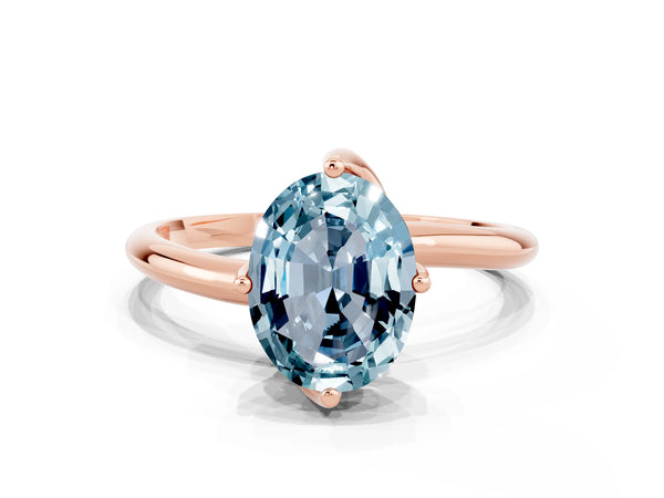 Rose gold Oval Cut Aquamarine Solitaire Engagement Ring with Four-Prong Setting and Classic Band