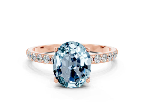 Rose gold Oval Cut Aquamarine Solitaire Engagement Ring with Pavé Band and Prong Setting