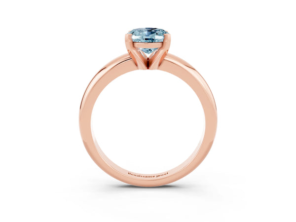 Rose gold Oval Cut Aquamarine Solitaire Engagement Ring with Round Band and Four-Prong Setting