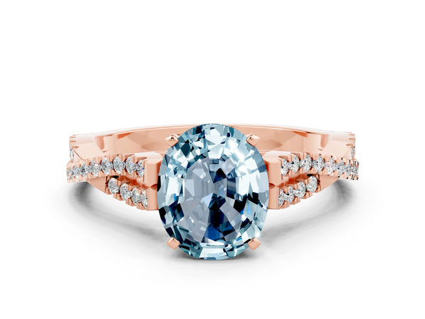 Rose gold Oval Cut Aquamarine Solitaire Engagement Ring with Twisted Pavé Band and Four-Prong Setting