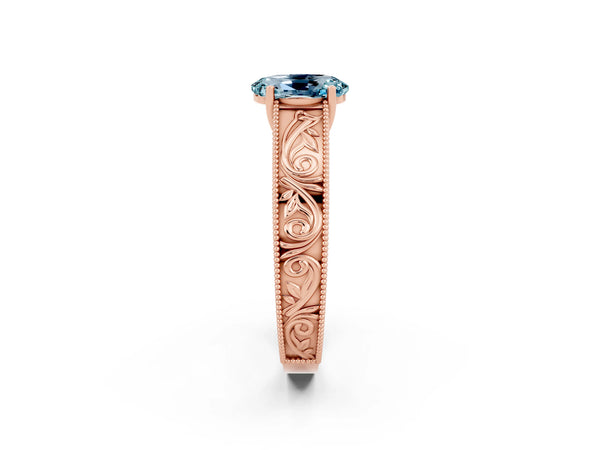 Rose gold Oval Cut Aquamarine Solitaire Ring with Engraved Band and Four-Prong Setting