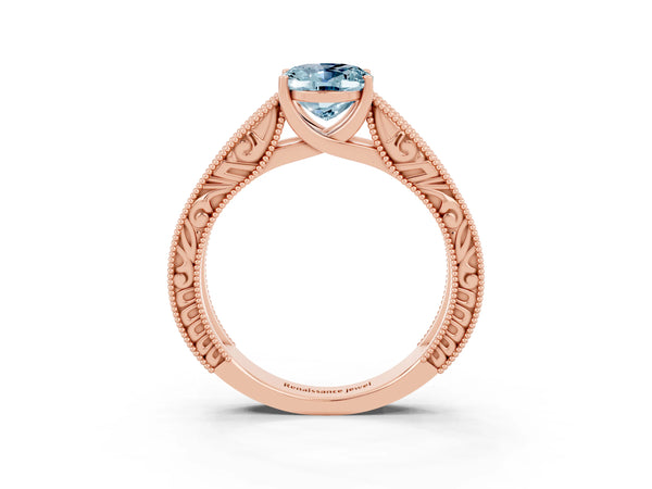 Rose gold Oval Cut Aquamarine Solitaire Ring with Engraved Band and Four-Prong Setting