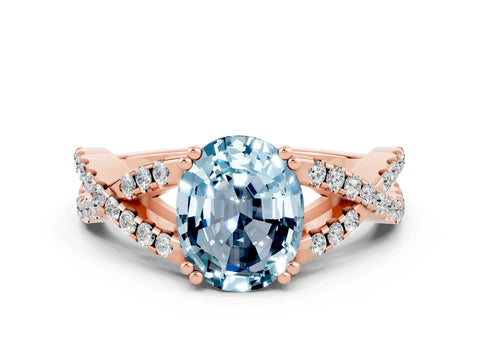 Rose gold Oval Cut Aquamarine Solitaire Ring with Four-Prong Setting and Twisted Pavé Band