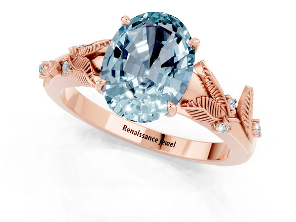 Rose gold Oval Cut Aquamarine Solitaire Ring with Leaf Motif Band and Four-Prong Setting