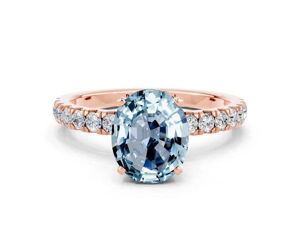 Rose gold Oval Cut Aquamarine Solitaire Ring with Pavé Accents and Four-Prong Setting