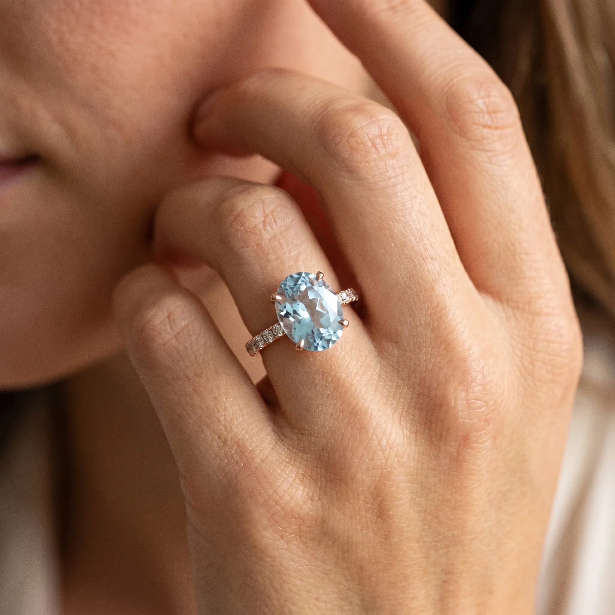 Rose gold Oval Cut Aquamarine Solitaire Ring with Round  Pavé Band and Four-Prong Setting_32