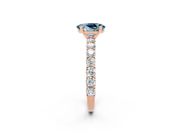 Rose gold Oval Cut Aquamarine Solitaire Ring with Shared Prong Pavé Band and Four-Prong Setting
