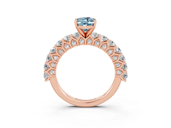 Rose gold Oval Cut Aquamarine Solitaire Ring with Shared Prong Pavé Band and Four-Prong Setting