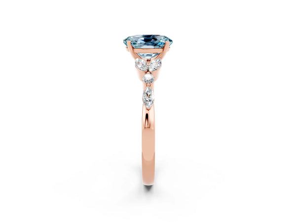 Rose gold Oval Cut Aquamarine Solitaire Ring with Side Stones and Four-Prong Setting