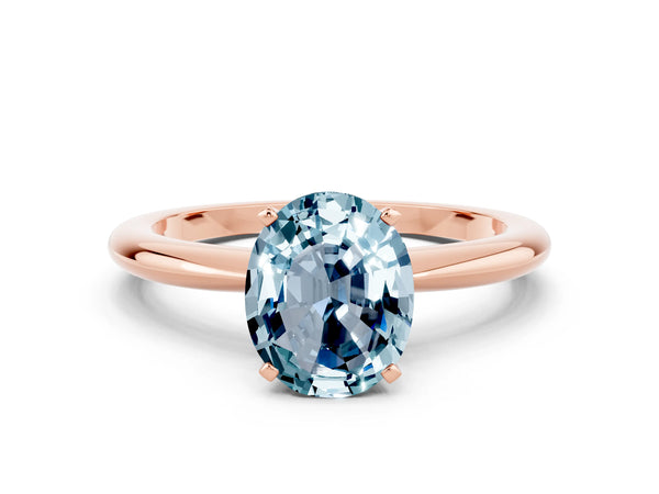 Rose gold Oval Cut Aquamarine Solitaire Ring with Six-Prong Setting and Classic Band