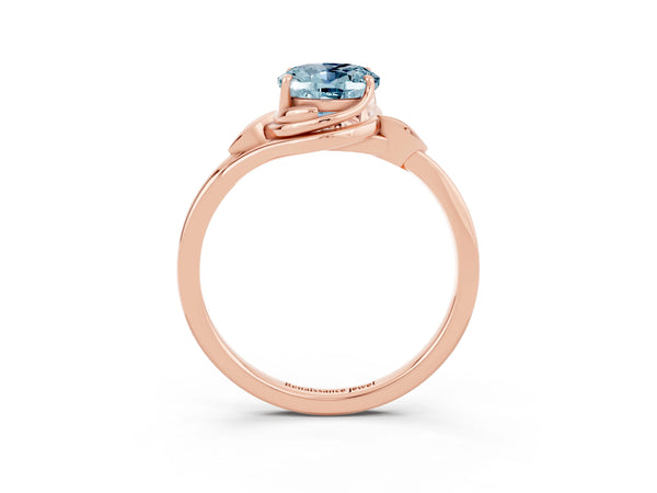 Rose gold Oval Cut Aquamarine Solitaire Ring with Twist Band and Four-Prong Setting